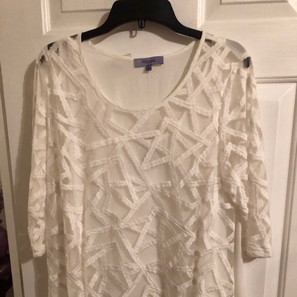 White blouse lovey to wear over any pant or skirt